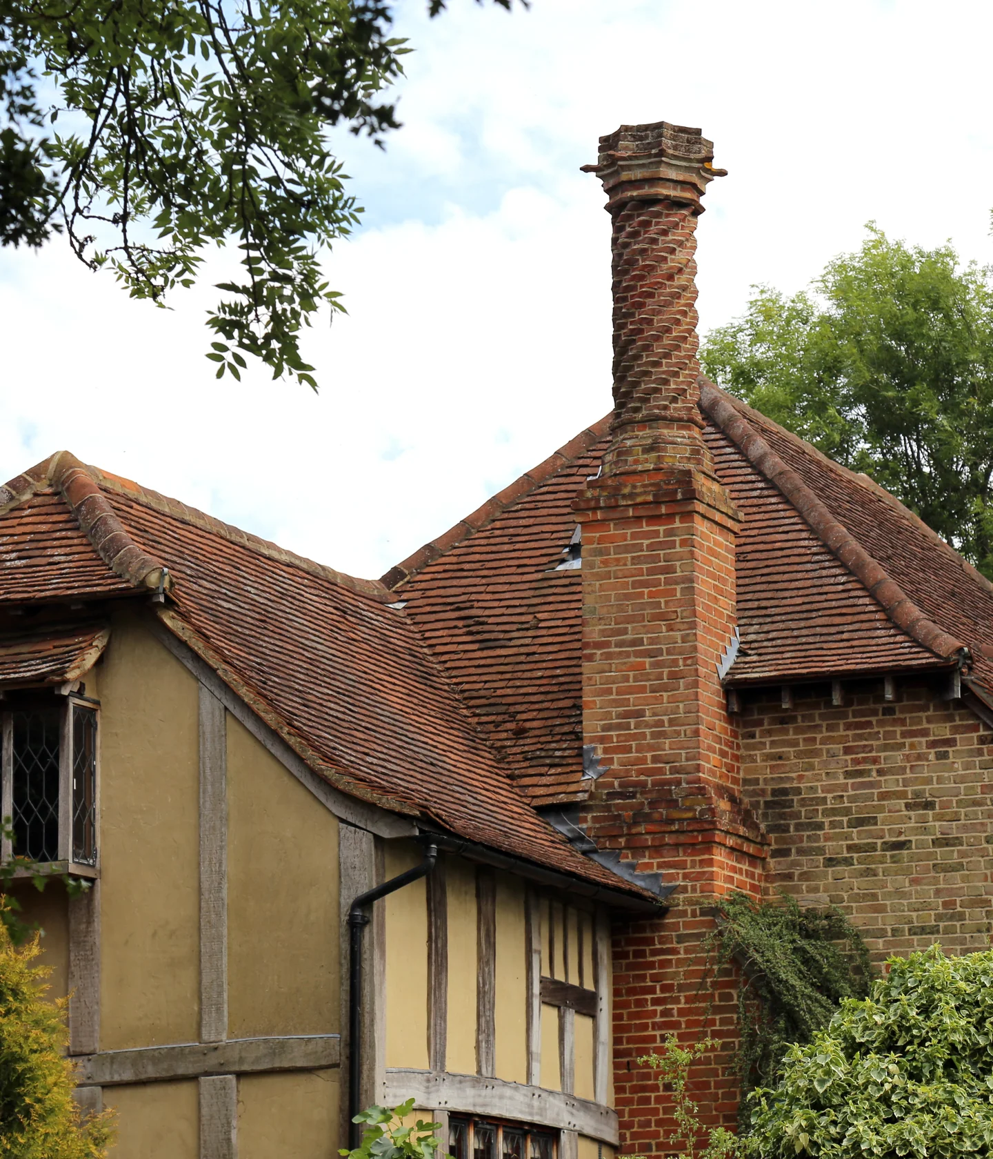 Illustrative English tiled roof and chimney